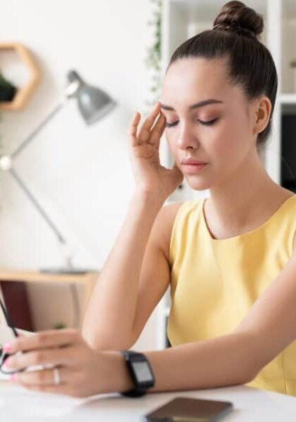 businesswoman with migraine