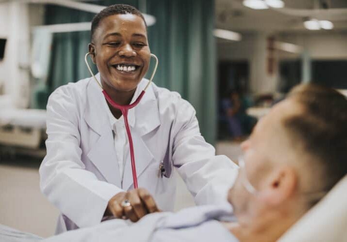 Doctor doing a checkup on a hospitalized patient